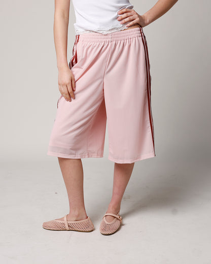 BLUSH LONGLINE MESH TRACK SHORT