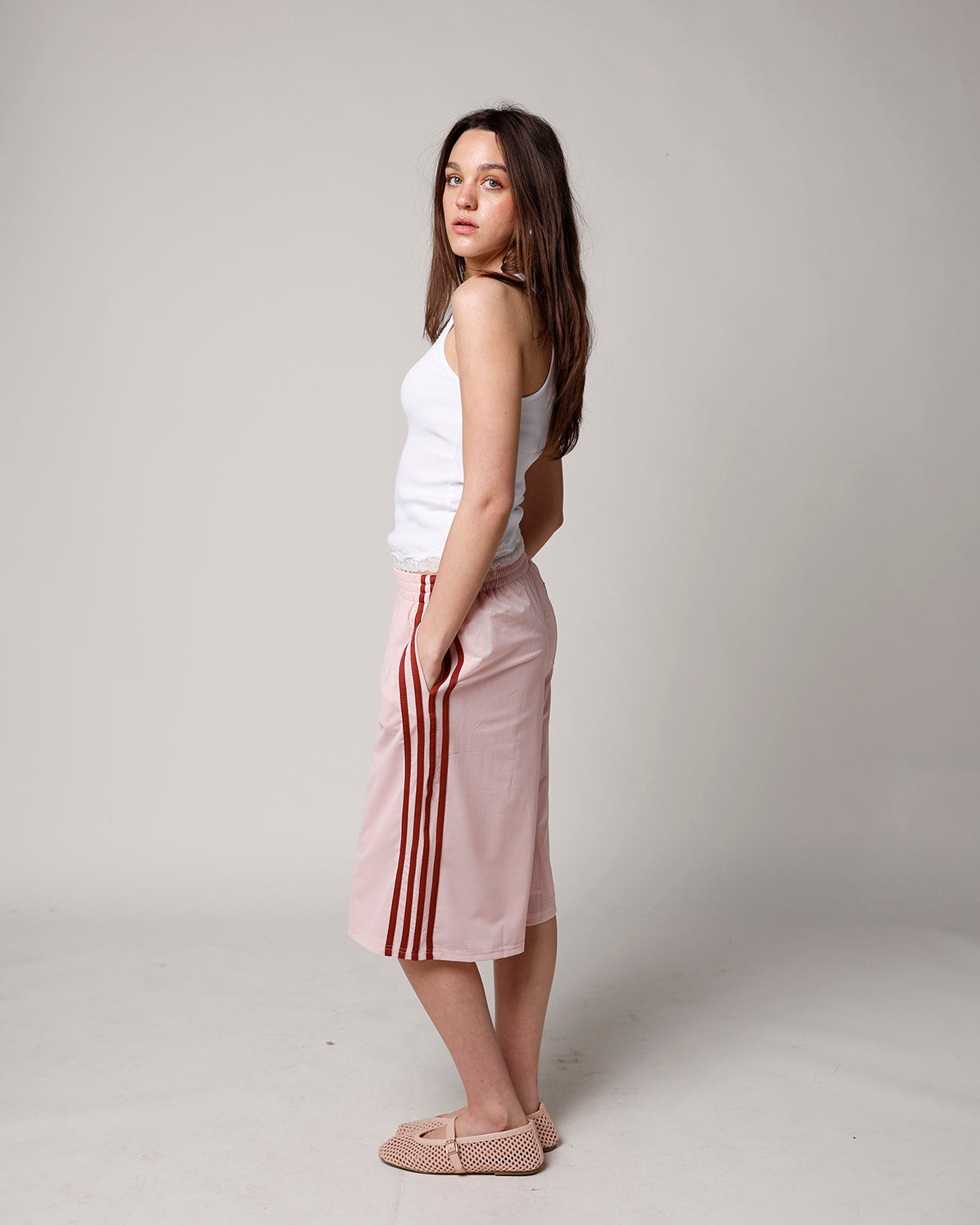 BLUSH LONGLINE MESH TRACK SHORT