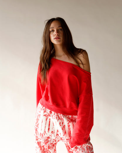 red off the shoulder top red off the shoulder sweatshirt raw hem off the shoulder red sweatshirt