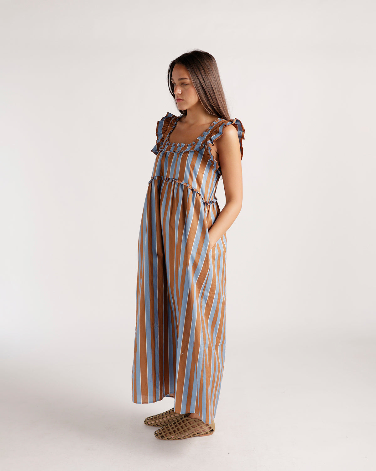 Striped blue and brown ruffle-strap midi dress with wide leg silhouette and pockets
