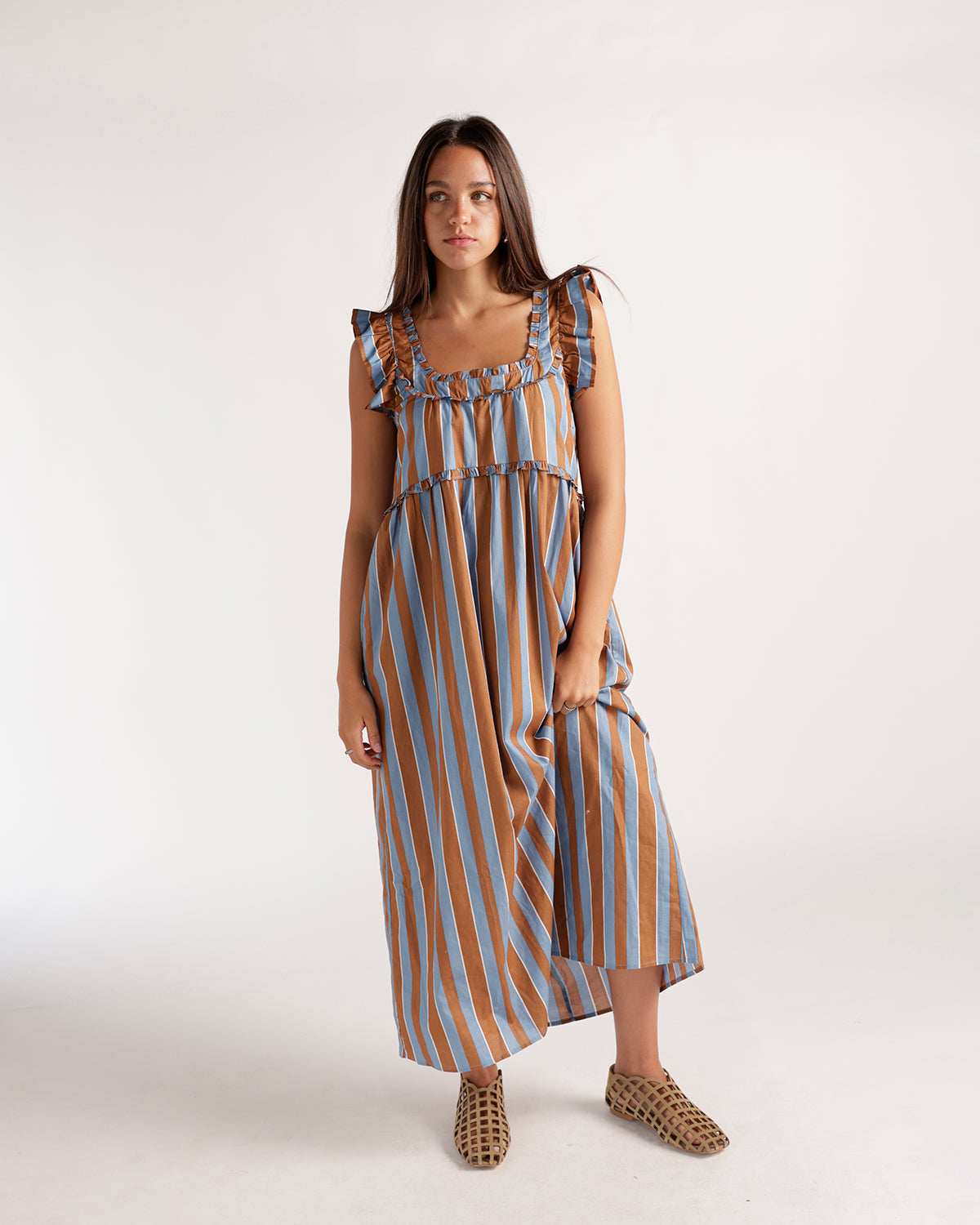 Brown and blue vertical striped midi dress with ruffle straps and gathered bodice