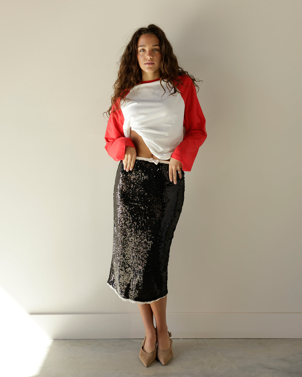 SHOWSTOPPER SEQUIN BLACK MIDI SKIRT