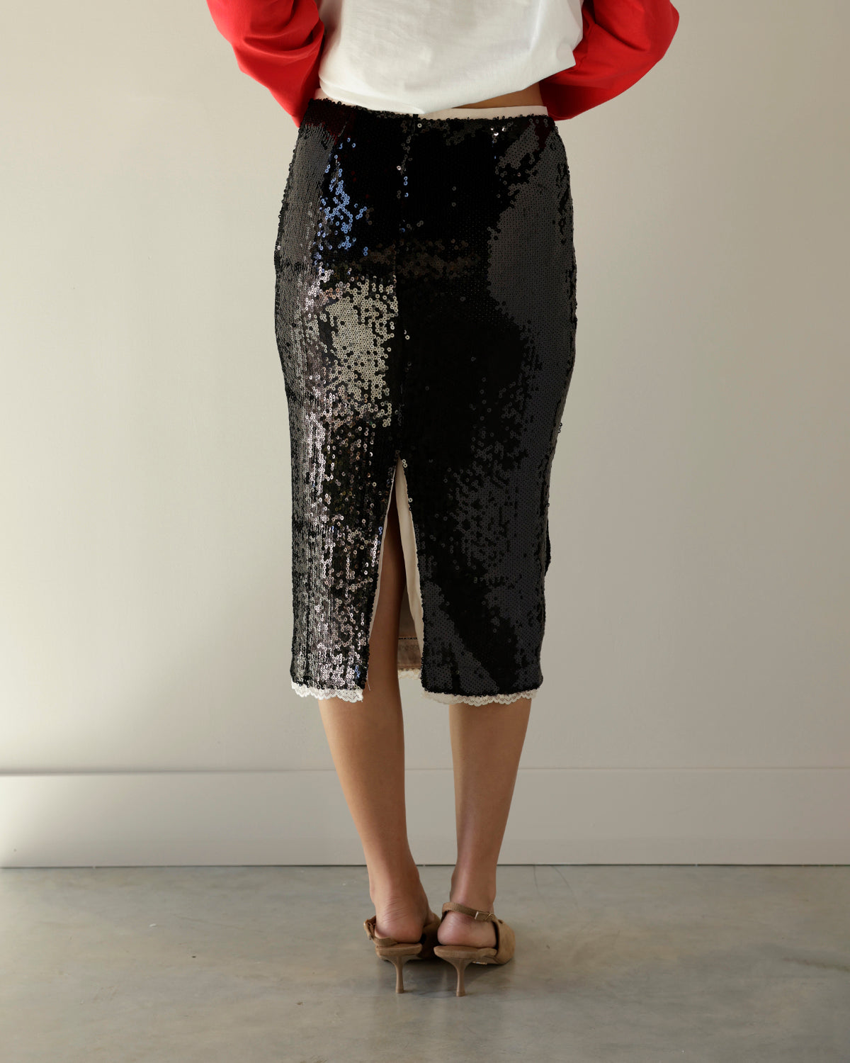 SHOWSTOPPER SEQUIN BLACK MIDI SKIRT