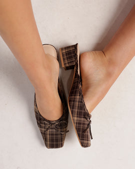 Brown plaid heeled mules with square toe and small bow detail