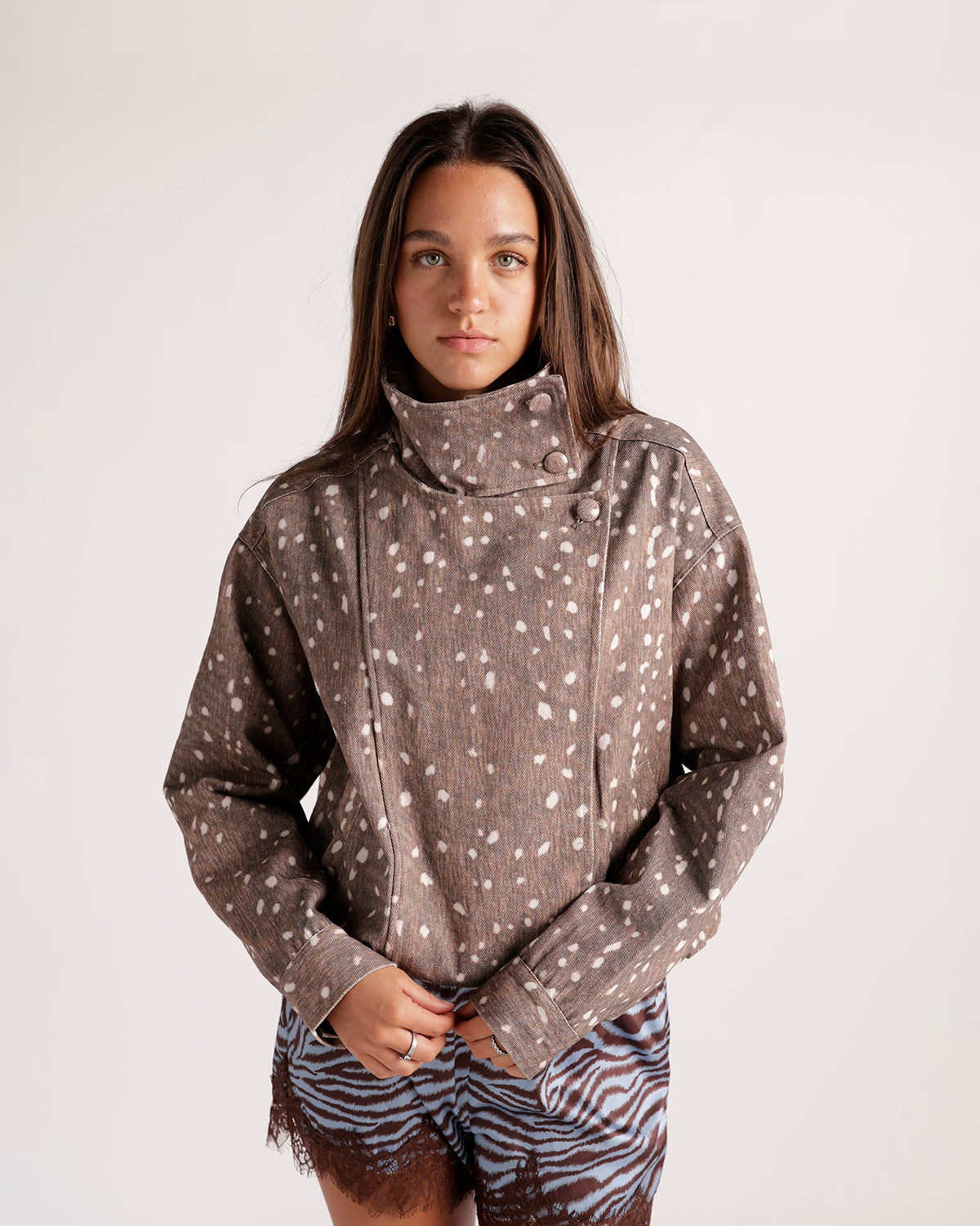 Brown fawn-spot print cropped jacket with high collar and button closure