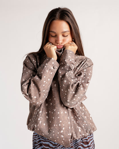 Oversized brown speckled fawn-print jacket with turtleneck collar and long sleeves