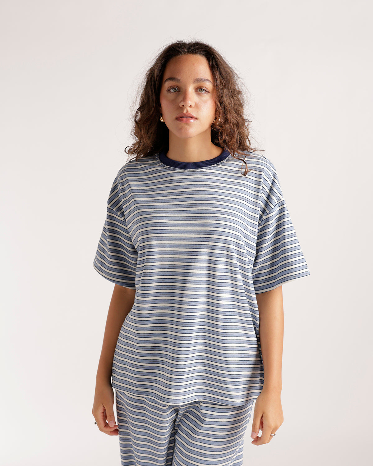 Oversized striped blue and cream short sleeve tee with navy ribbed crew neck