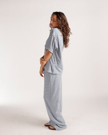 Women's striped short sleeve oversized top in blue and white horizontal stripes