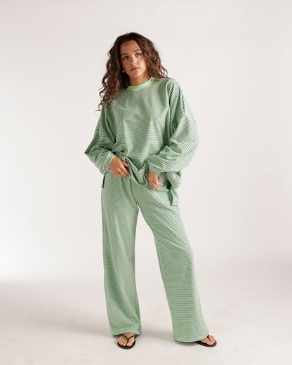 Oversized green and white striped long sleeve crew neck top with relaxed fit