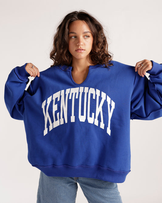 Oversized royal blue Kentucky sweatshirt with split neckline and white arch lettering