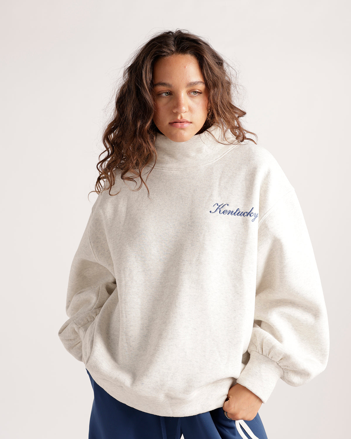 Oversized oatmeal mock neck sweatshirt with blue Kentucky script embroidery