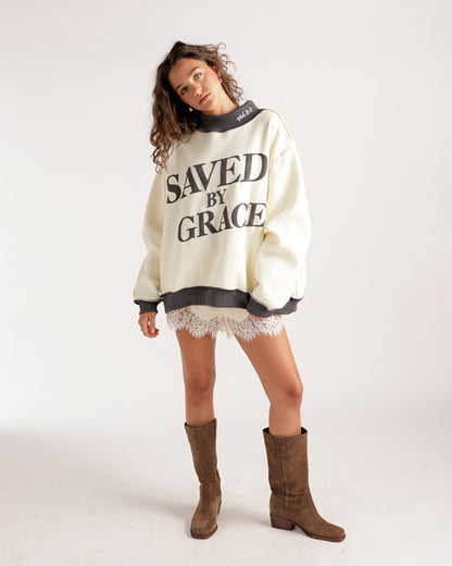 Oversized cream mockneck sweatshirt with Saved By Grace graphic print in charcoal