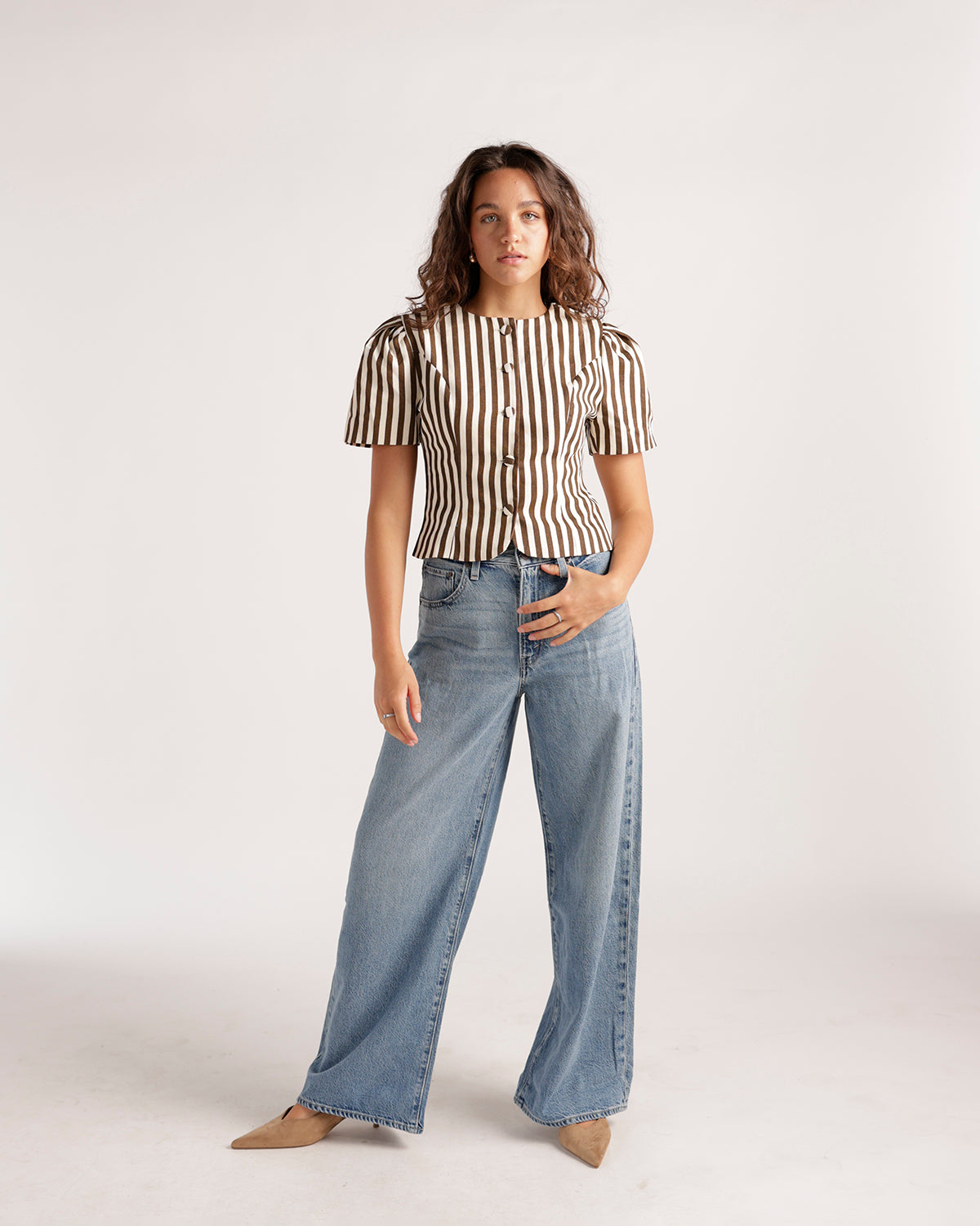 Light blue wide-leg denim jeans with a relaxed fit and subtle wash