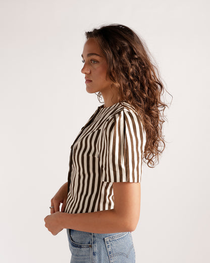 Brown and white vertical stripe cropped button-up top with short sleeves
