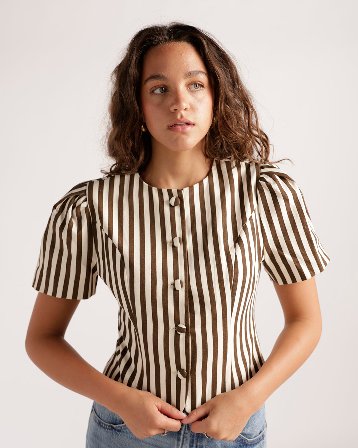 Brown and white vertical stripe button-front short puff sleeve fitted top