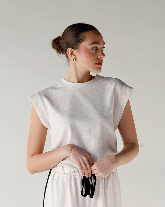 oatmeal colored short sleeve sweater with ruching detail. muscle tank lounge top