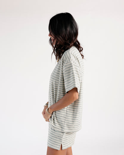 Oversized striped tee dress in cream and sage green, short sleeves, side slit