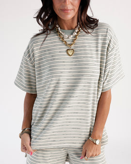 Add a warm touch to your casual look with this mint condition Striped Tee. Comes with contrasting mint neckline and soft material for comfort.