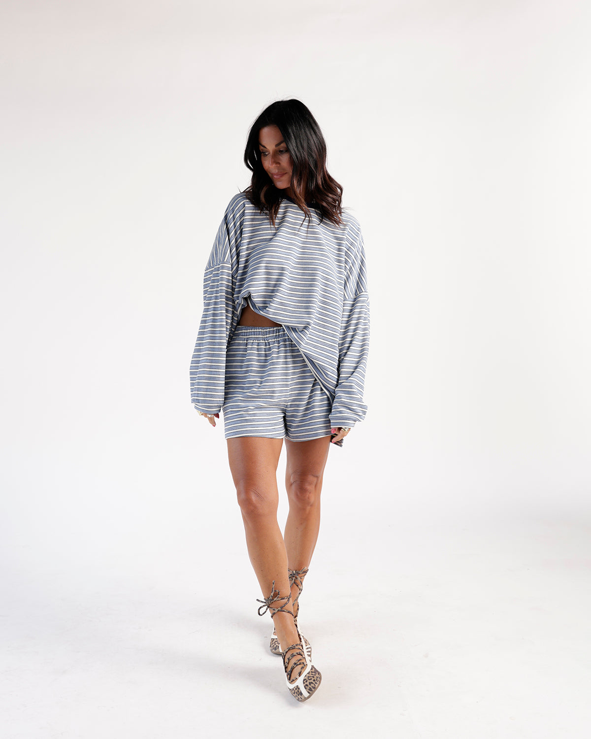 Oversized striped blue and white long sleeve top with relaxed fit
