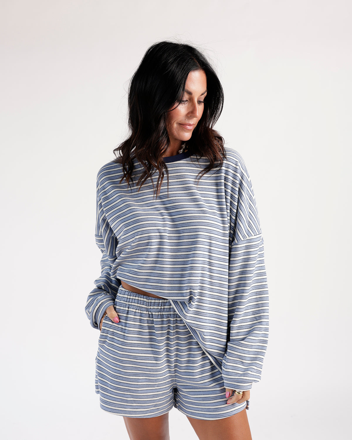Blue and white striped casual shorts with elastic waistband and side pockets