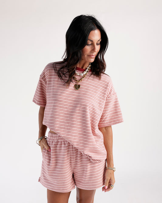 Oversized pink and red striped short sleeve tee with relaxed fit
