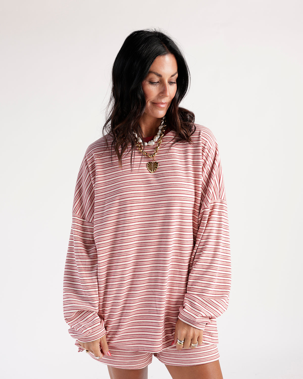 Oversized red and white striped long sleeve top with drop shoulders