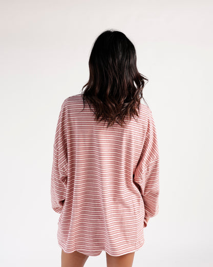 Oversized red and white striped long sleeve top, back view, relaxed fit