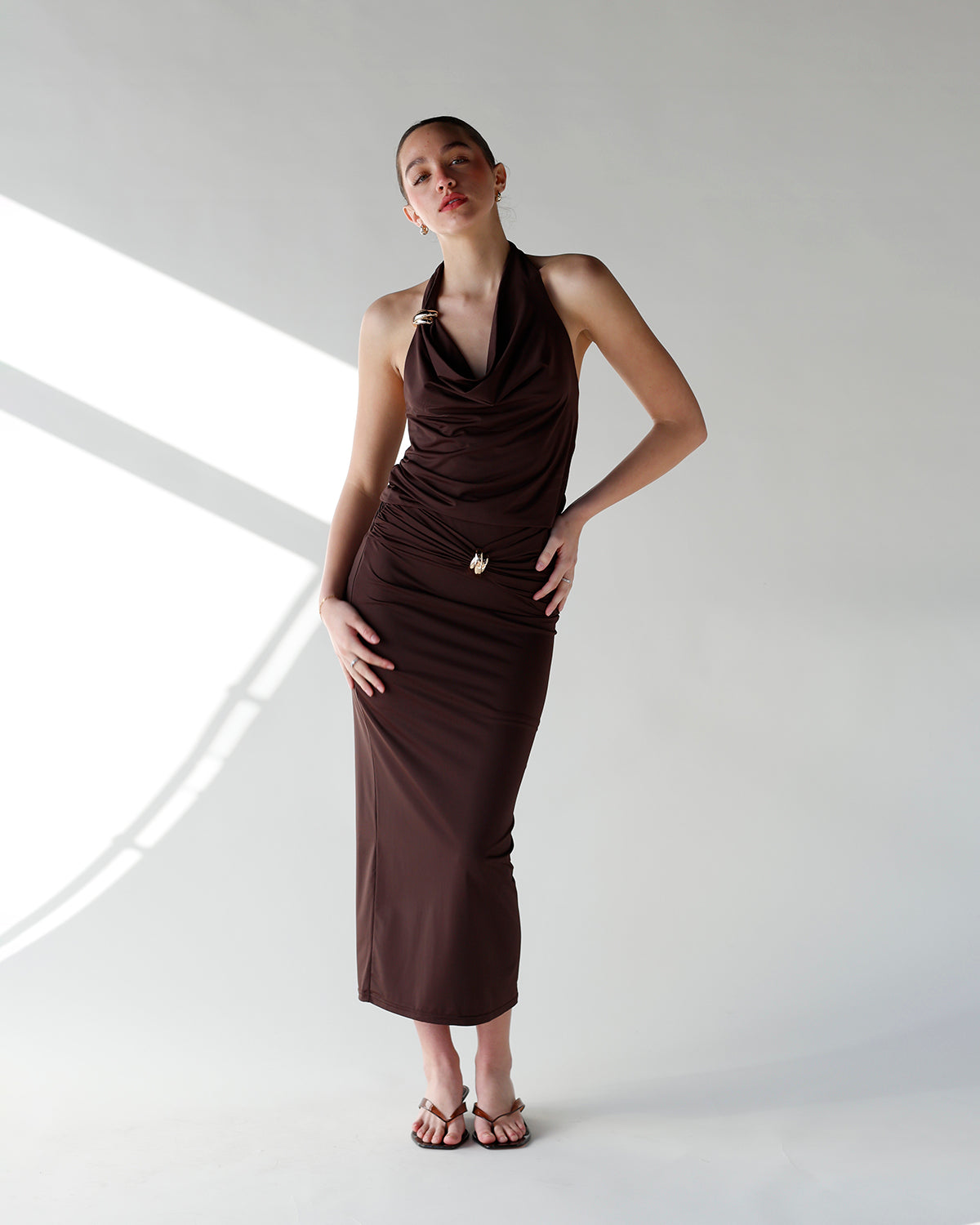 brown ruched maxi skirt with gold accent
