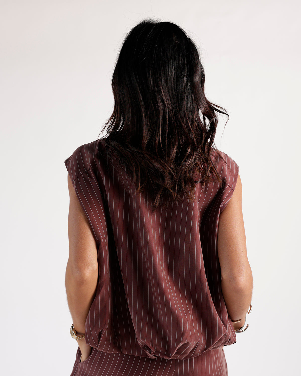 Sleeveless mulberry striped vest top, back view, relaxed fit with elastic hem