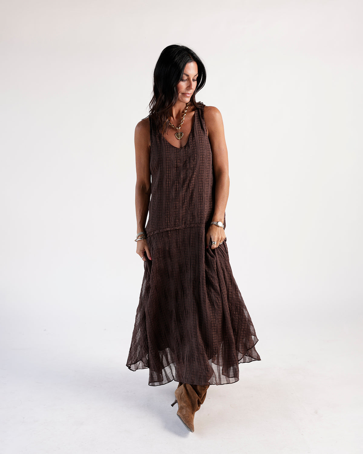 Brown plaid crinkle sleeveless maxi dress with flowy skirt and V-neckline