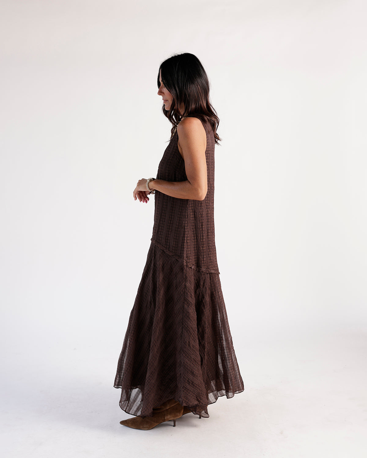 Brown plaid crinkle sleeveless maxi dress with tiered flowy skirt and sheer hem
