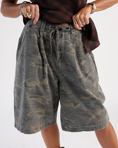 Stay stylish with these camo shorts. Features a faded olive camouflage print, drawstring waistband, and front patch pockets.