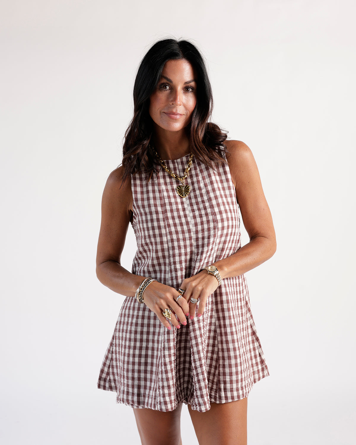 Burgundy and white gingham sleeveless mini dress with pleated skirt