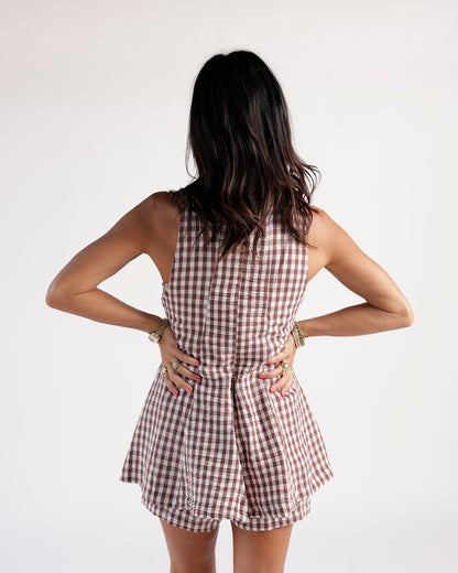 Burgundy and white gingham mini dress with racerback, worn back-facing