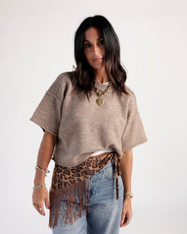 Effortless staple sweater crafted from a soft knit blend. Timeless and versatile, perfect for layering and everyday wear. Offers relaxed, flattering fit.
