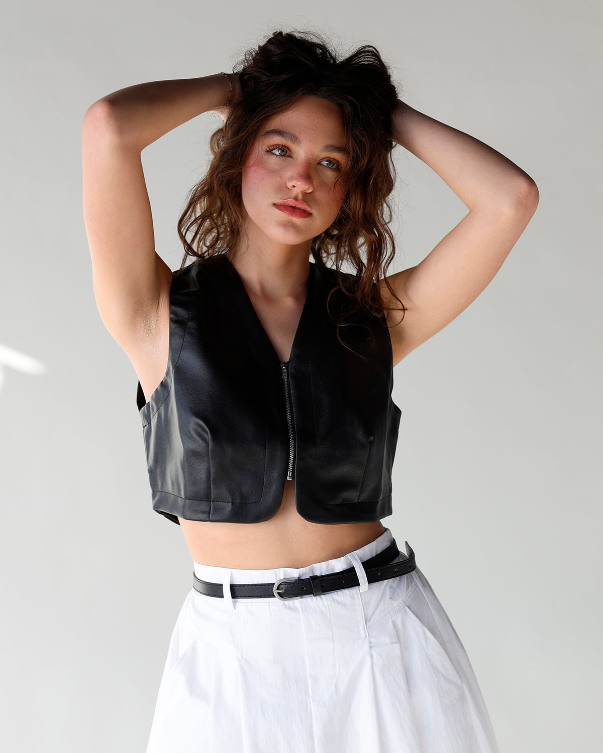 cropped black leather zip up vest