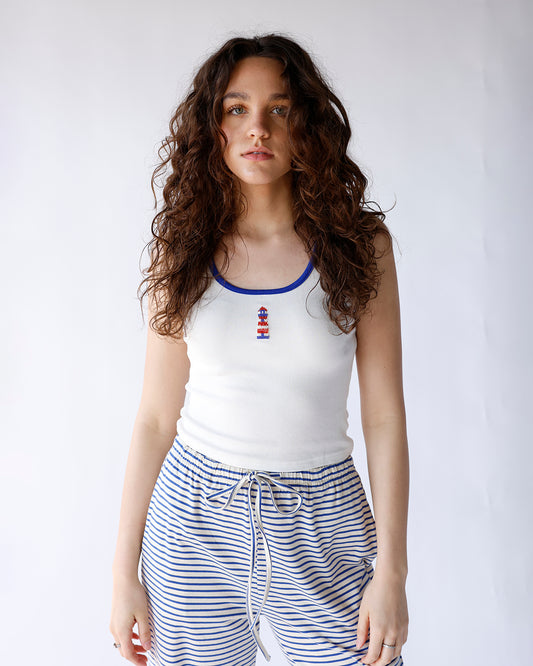 white ribbed tank top with blue contrast and embroidered beaded lighthouse