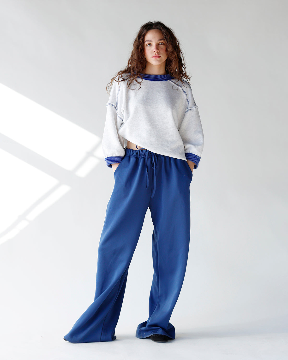 grey quarter sleeve crewneck with blue contrast trim everyday crewneck