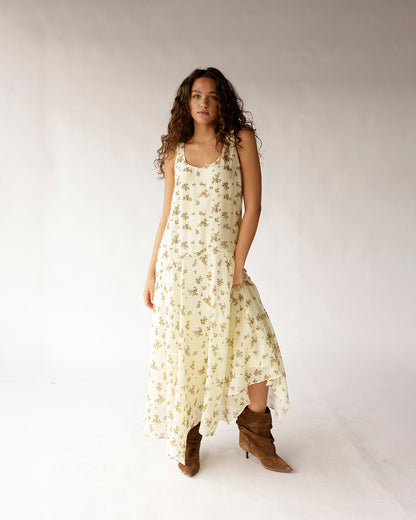 Cream floral sleeveless drop waist maxi dress with handkerchief hem and pockets