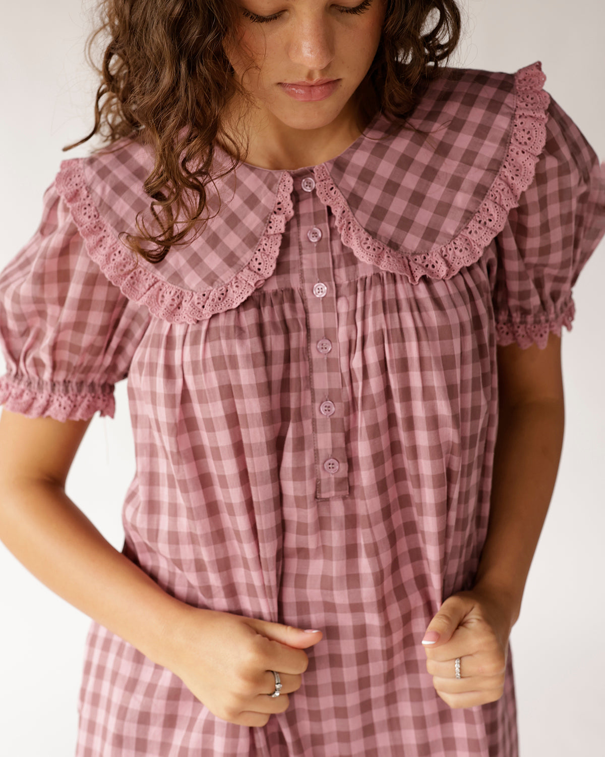 Pink gingham mini dress with oversized lace-trimmed Peter Pan collar and puff sleeves