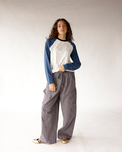 Wide-leg gray cargo pants with drawstring waist and large side pockets