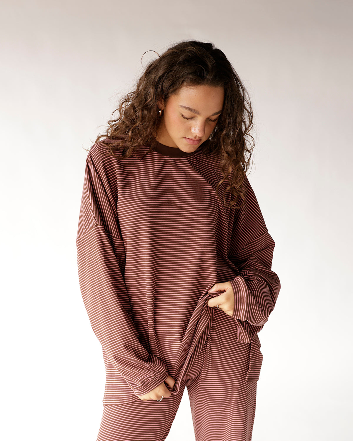 Oversized brown and cream striped long sleeve top with mock neck