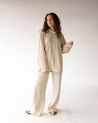Oatmeal striped wide leg pants with matching long sleeve top, worn with leopard flats