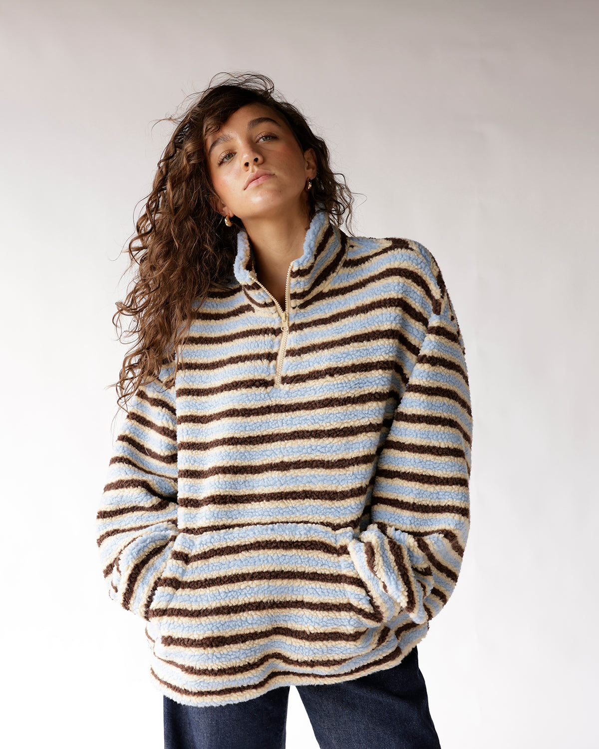 Blue cream and brown striped sherpa quarter-zip pullover with kangaroo pocket