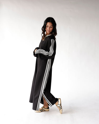 Black maxi track dress with white triple stripes on sleeves and sides