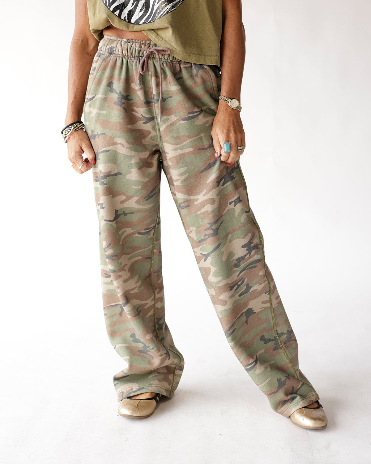Muted camo wide-leg sweatpants with drawstring waist, relaxed fit, full length