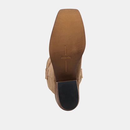Bottom sole view of tan suede western boot with stacked heel