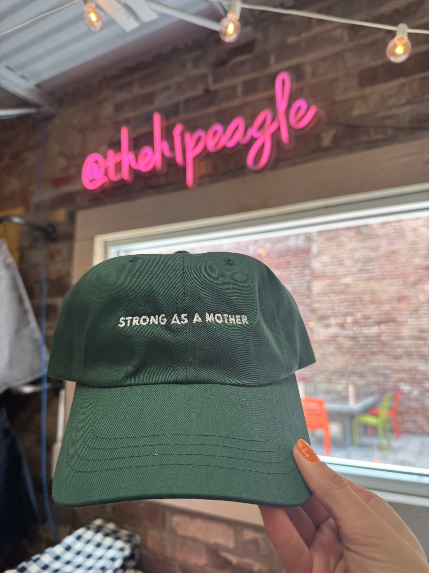 STRONG AS A MOTHER HAT