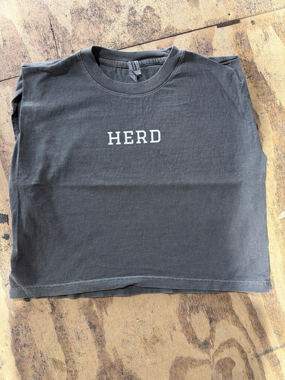 Vintage black cropped muscle tee with white HERD text on chest