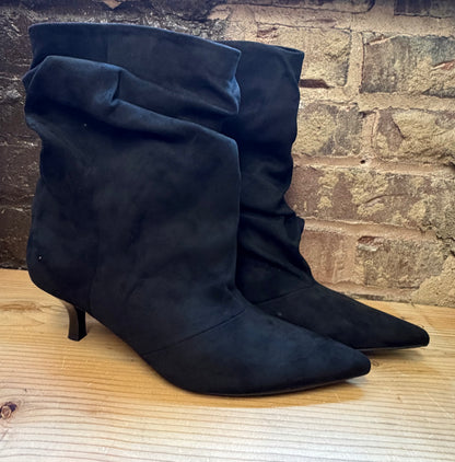 Black suede slouch mid-calf booties with kitten heel and pointed toe